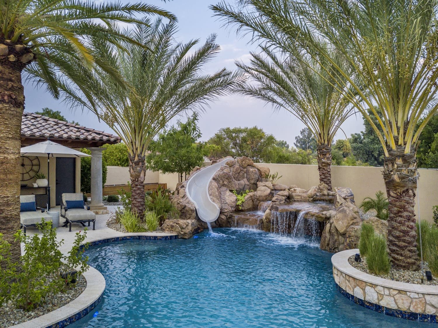 Aerial of a geometric pool and outdoor living program