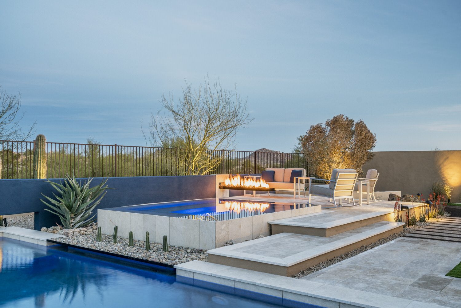Raised spa with sheer descents