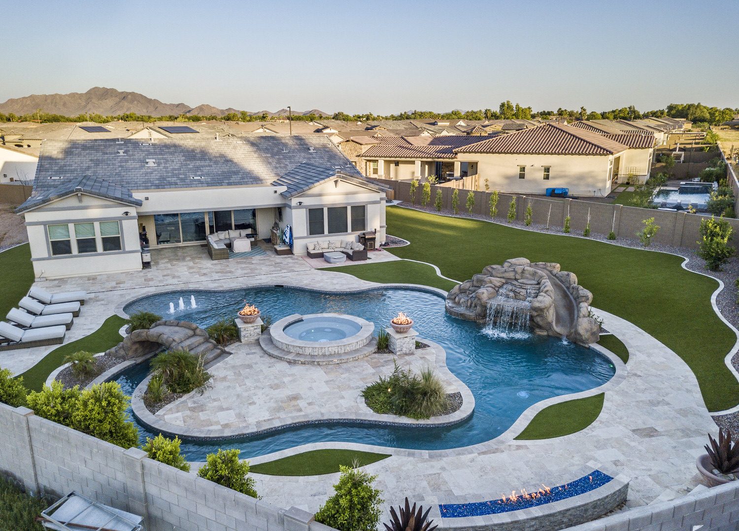 Freeform pool with boulder waterfall