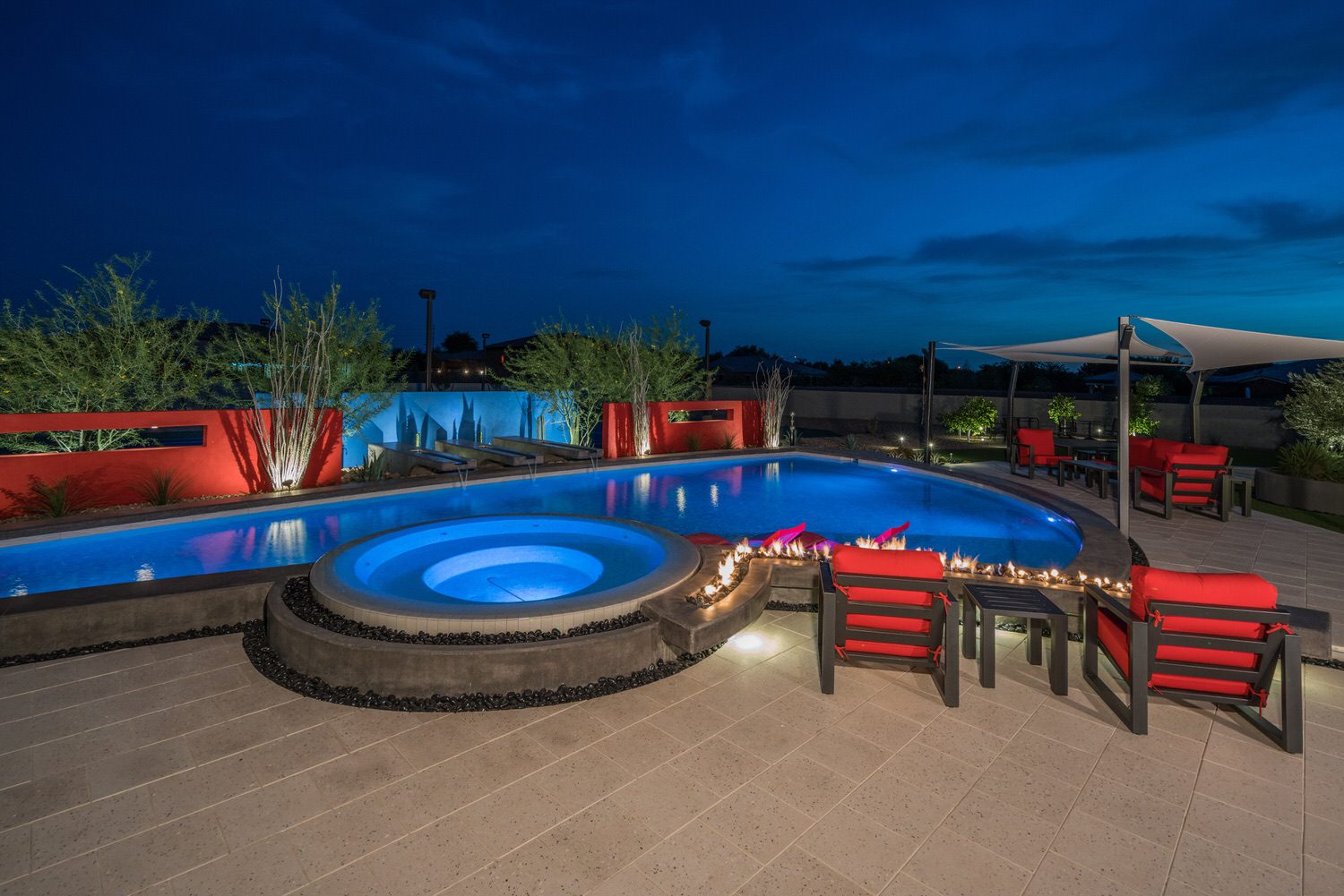 Spa with fire bowl at night